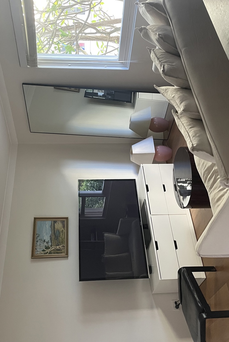 Our home is a warm, art-deco space in Vaucluse wit