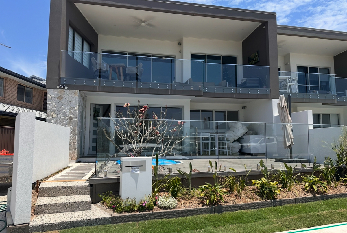 Modern villa on the water overlooking bay islands