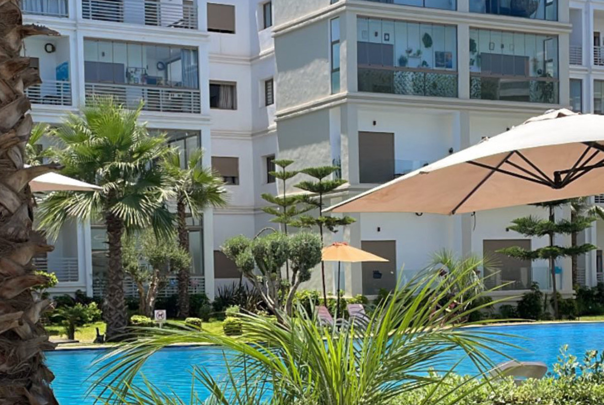 beach house in a calm residency with a pool